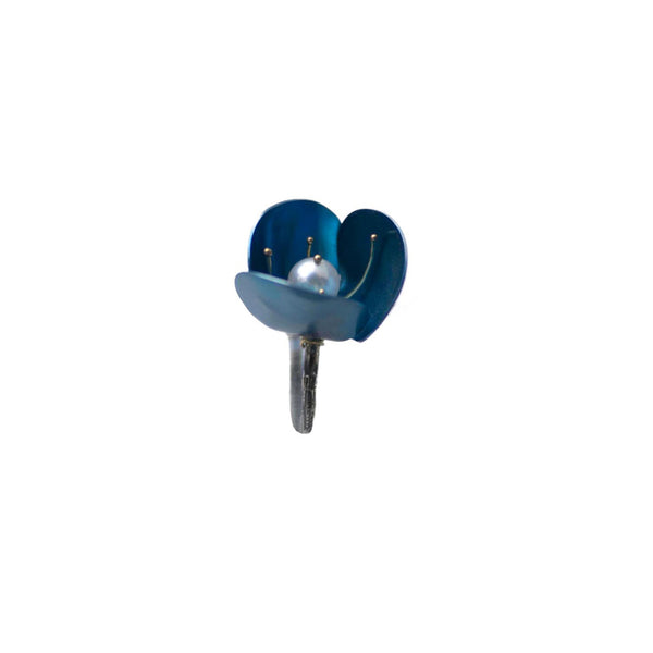 Titanium ring, handmade, portraying an anemone flower made of deep blue titanium with a fresh pearl in the middle surrounded by golden flower stems.