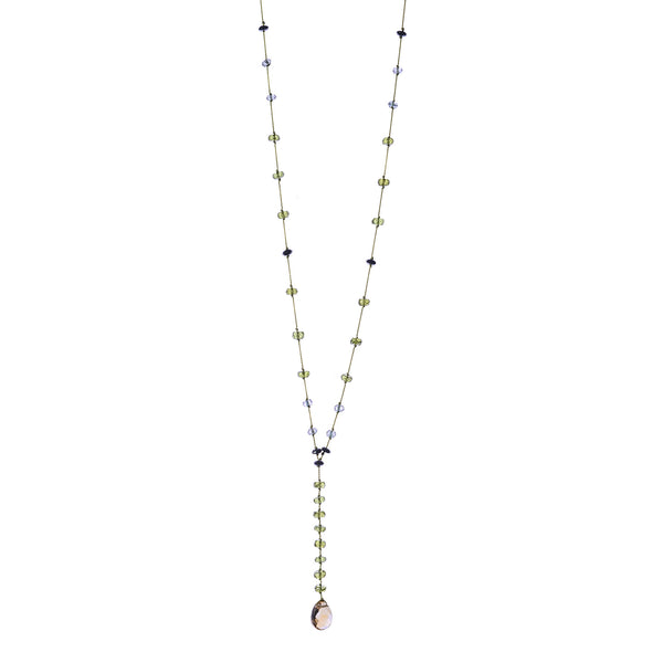 A chest-long necklace made of peridot, iolite and citrin gem stones, love and fantasy! A celebration of green, blue and yellow, in a minimal, tender and yet very impressive visual effect. A tie-shape neclace with the drop-shape citrine at the end.