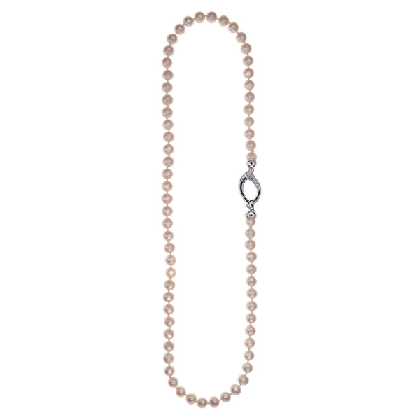 Α fresh-water pearl fragrant necklace with a beautiful silver platinum-plated clasp.  A timeless classic piece for every occasion!