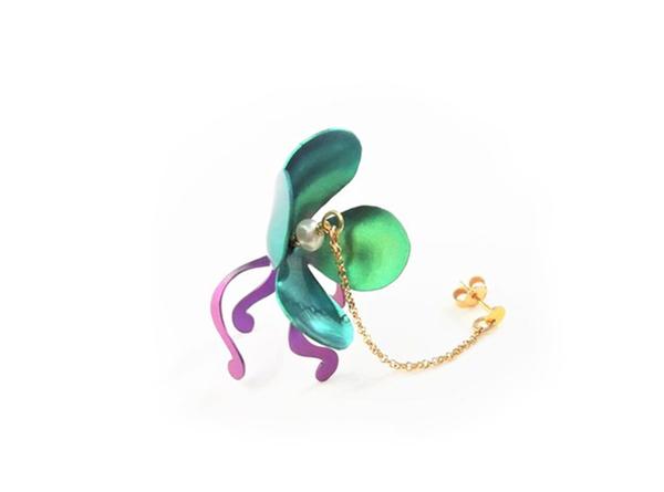 Long chain earrings with gold chain and titanium water lily flower in green and purple.